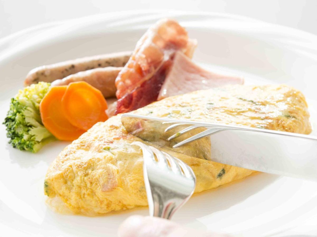 호텔 오쿠라 Jr 하우스 텐 보스 사세보 외부 사진 An omelette with ham and sausages