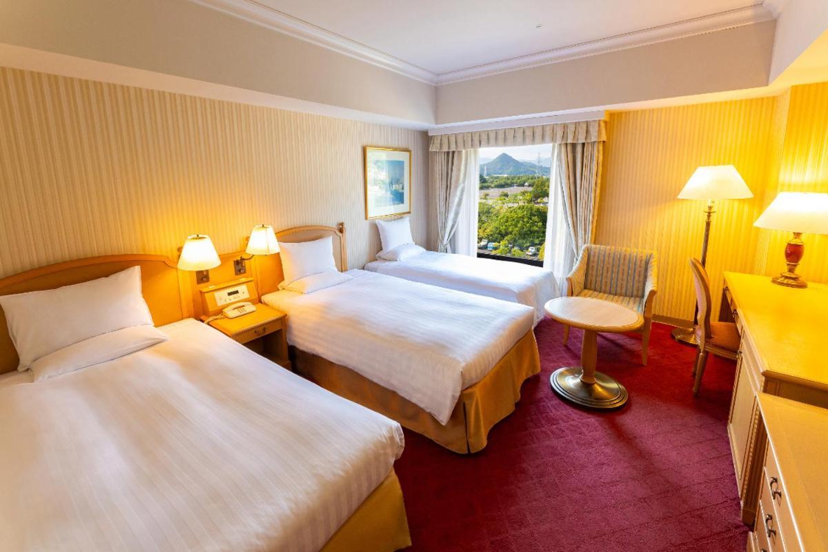 호텔 오쿠라 Jr 하우스 텐 보스 사세보 외부 사진 A room at the Killarney International Hotel